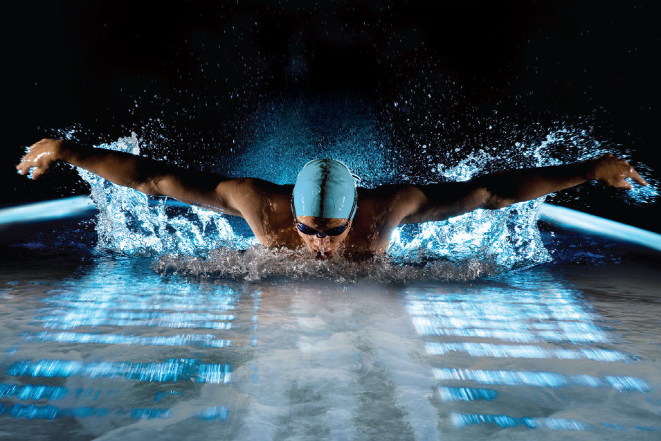 man swimming in a pool