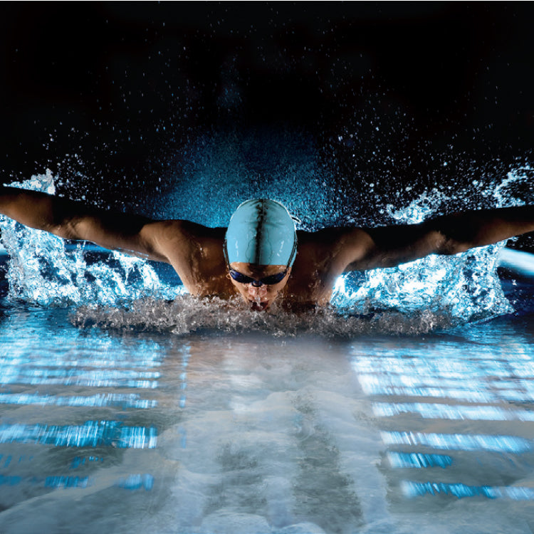 man swimming in a pool